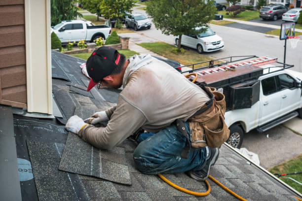 Professional Flat Roof Repair technician working in Whitehall, MI